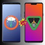 Two smartphones side by side comparing Android 14 and Android 15, with Android 14 shown on left phone with blue gradient background and circular logo, Android 15 on right phone with orange-pink gradient background and shield-shaped logo, connected by a colorful 'VS' graphic in the center