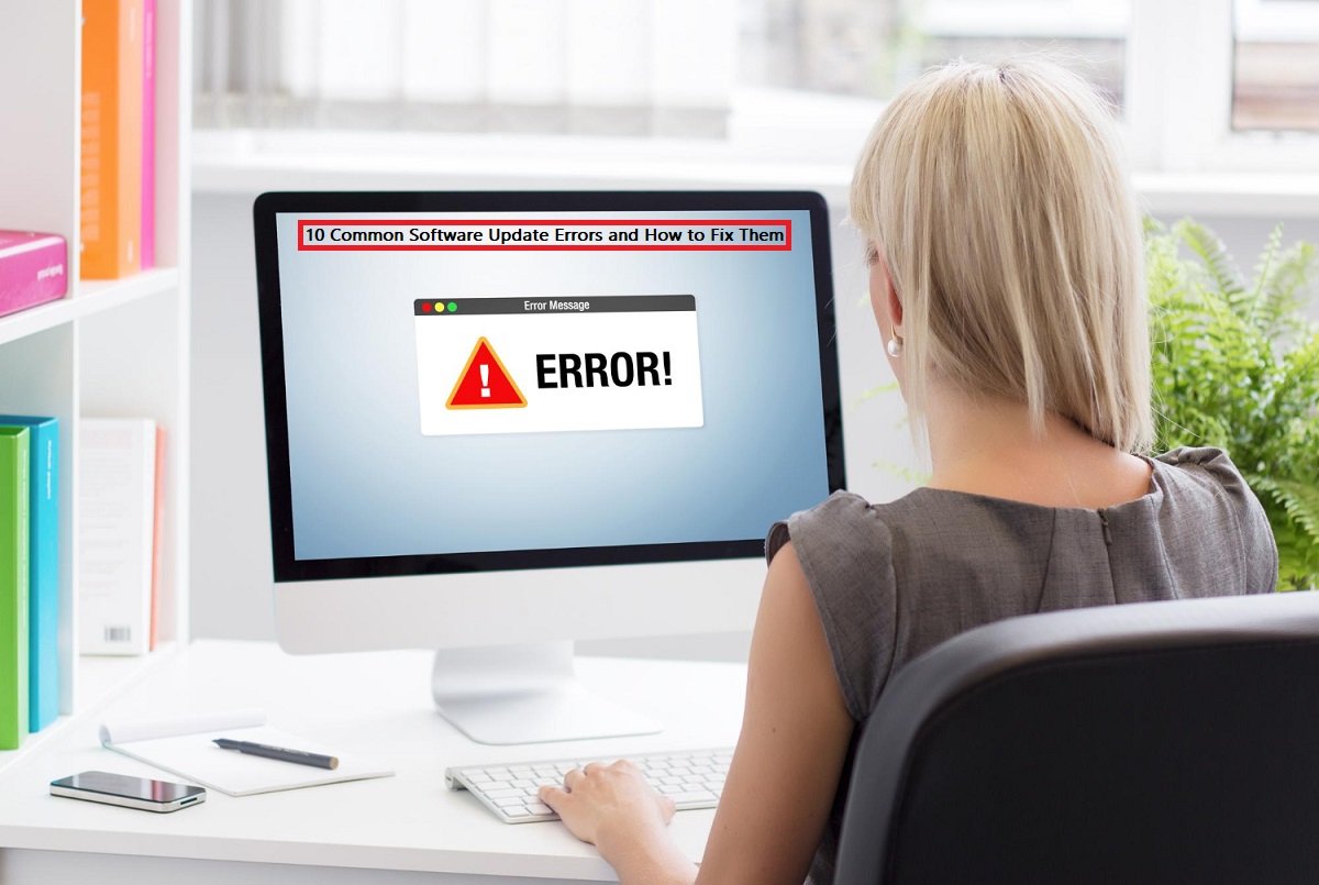 Woman looking at computer screen displaying error message during software update failure
