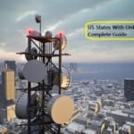 Telecommunications tower with satellite dishes and antennas overlooking a snowy city skyline, representing area code infrastructure in US states